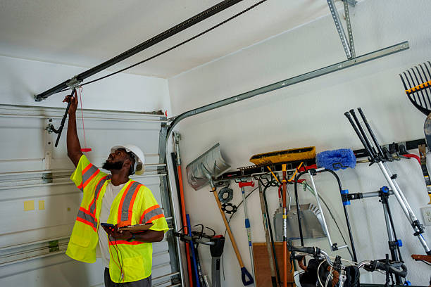 Professional Garage Door Panel Replacement technician working in Paul, ID